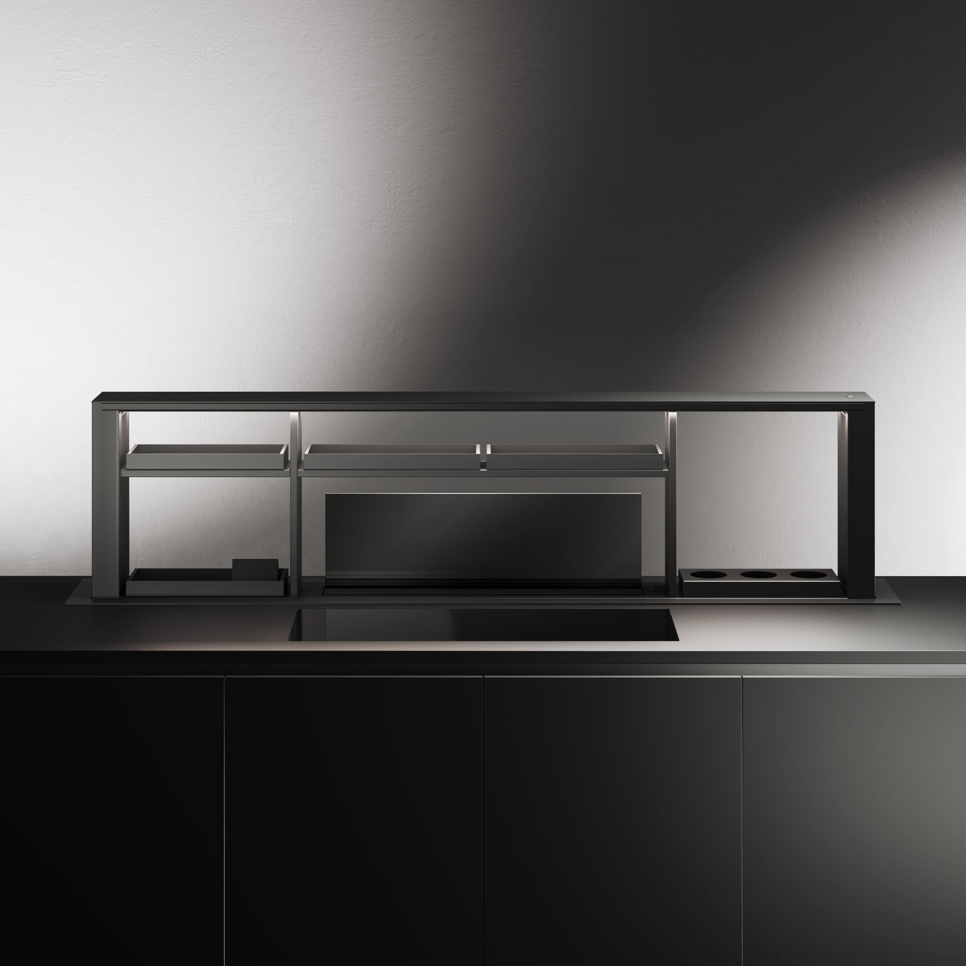 Luxury 200cm Downdraft Cooker Hood With Gourmet Station And Charging Bank Installed Within a Large Modern Dark Kitchen With Gas Hob