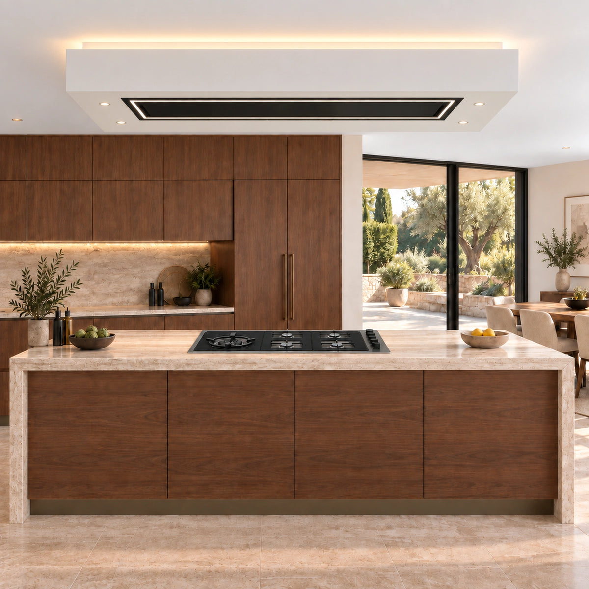 Caporra 180cm matte black ceiling extractor fitted into a custom dropped ceiling box with warm concealed lighting and recessed spotlights.