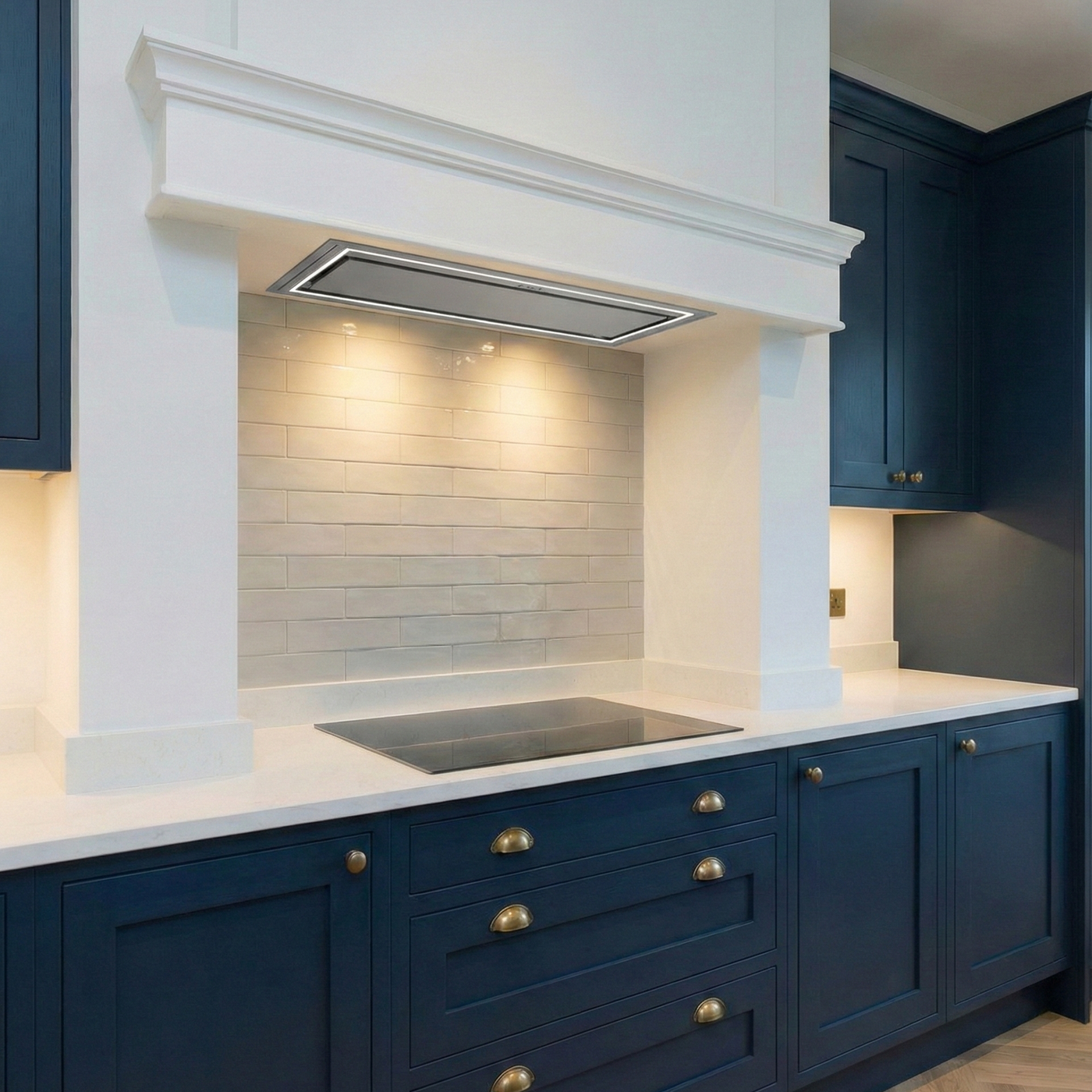 Built-in Caporra Canopy Cooker Hood in a Modern Blue Shaker Kitchen