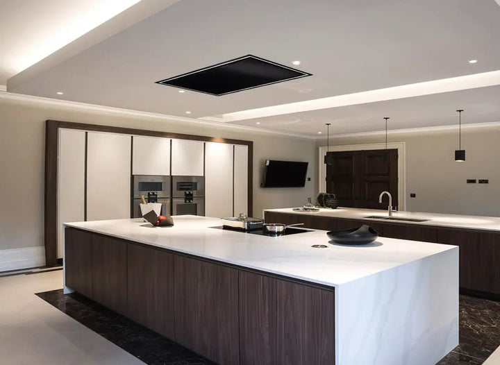 Black Caporra Ceiling Hood, within a large, modern & open plan kitchen.