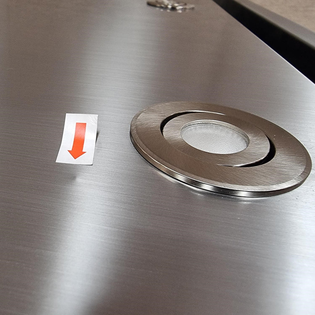 Small Dimple Mark On Door Near LED