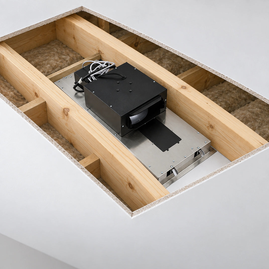 A ceiling-mounted black rectangular device with attached cords and a protruding black strip, installed on a metal track inside a wooden-framed ceiling cavity with insulation visible.