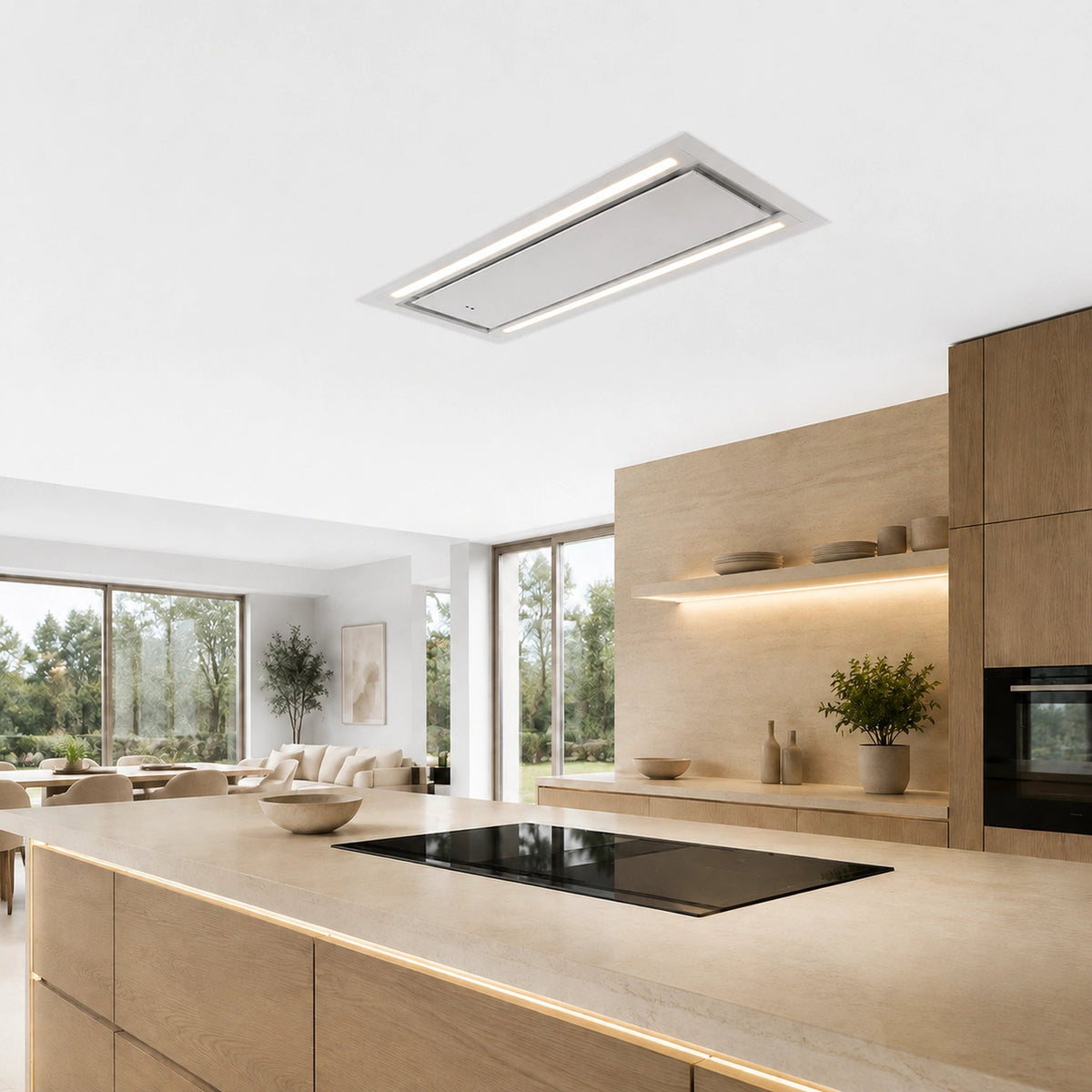 A modern Mira ceiling mounted ceiling hood with integrated LED lighting, shown installed in a bright, contemporary kitchen with light wood cabinetry and large windows.