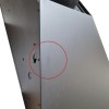 Paint defect running along the side panel